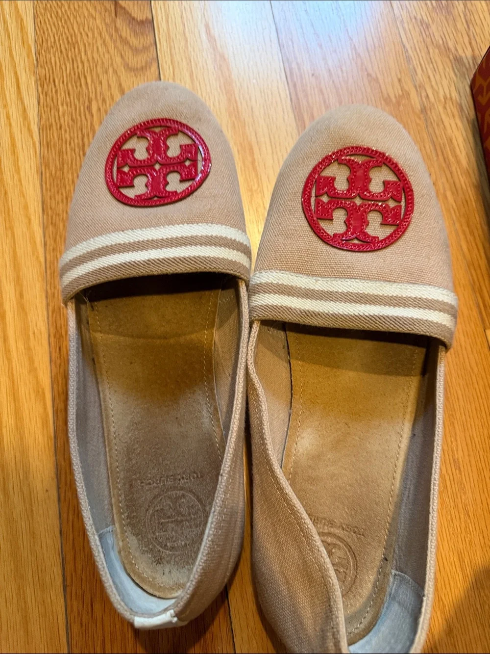 Tory Burch Tan Canvas Slip-Ons with Red Logo Medallions